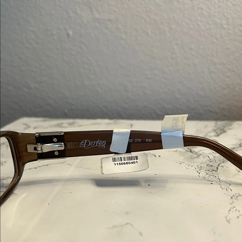Dereon Elegant Brown With Silver Accents Women's Glasses. Size 53-17-135